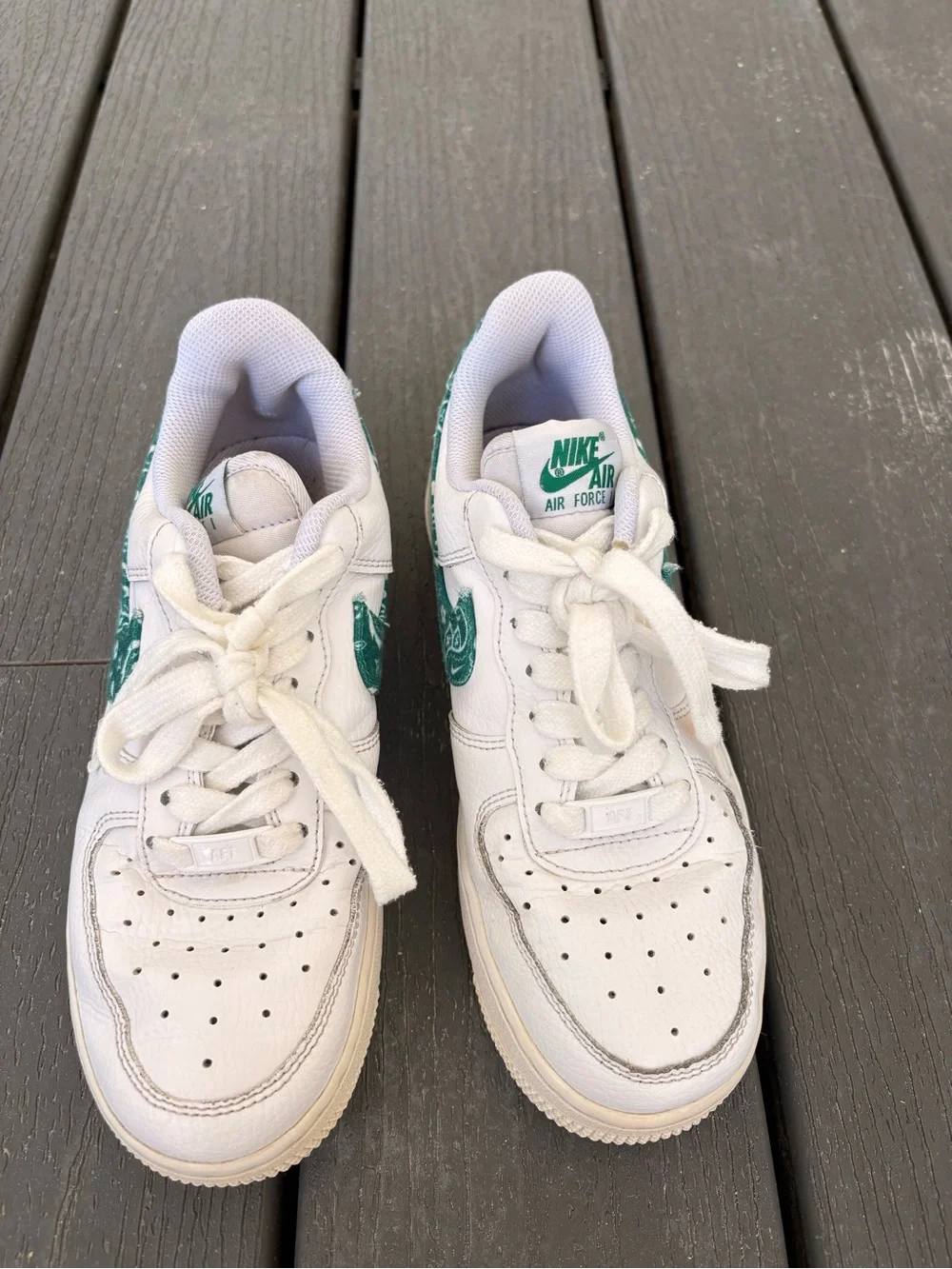 Nike Womens White Sneakers with Green Swoosh Accent